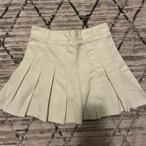 brandy melville cream pleated skirt